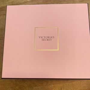 Pink gift boxes with ribbon and sticker